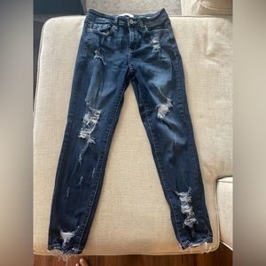 Ripped dark wash skinny jeans